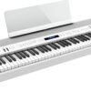 Piano numérique blanc avec claviers et boutons.