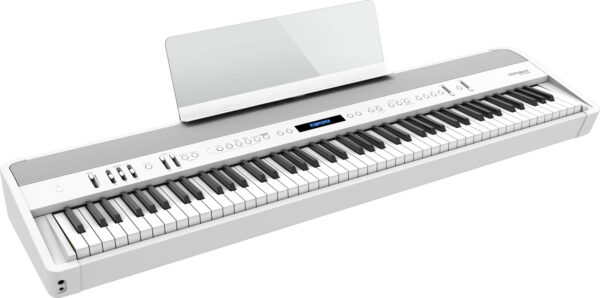 Piano numérique blanc avec claviers et boutons.